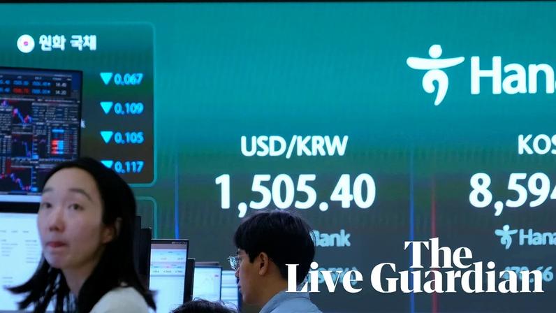 Currency traders watch monitors at the foreign exchange dealing room of the Hana Bank headquarters in Seoul, South Korea.