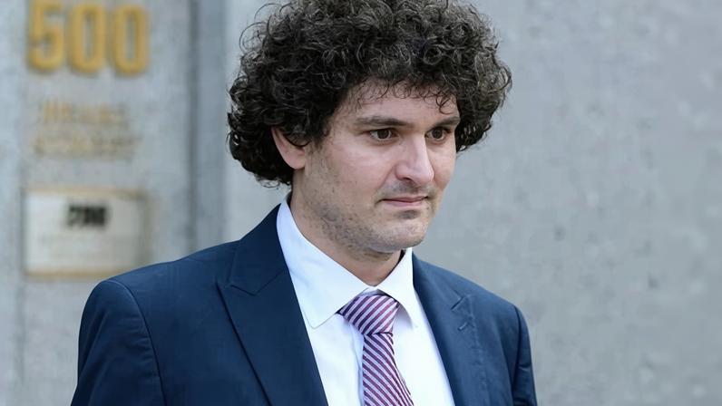 FTX founder Sam Bankman-Fried leaves federal court on 26 July 2023, in New York.