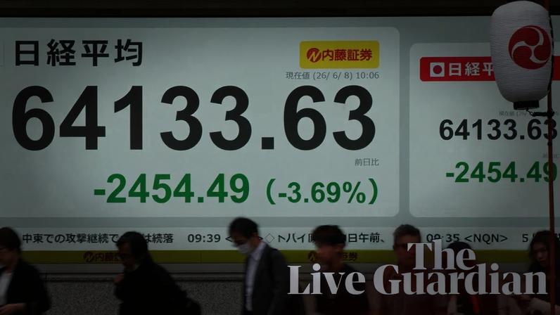 An electronic quotation boards displaying the Nikkei Stock Average in Tokyo today