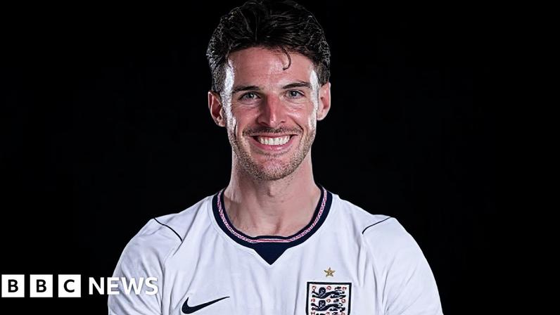 Declan Rice in an England shirt with a sunburned face
