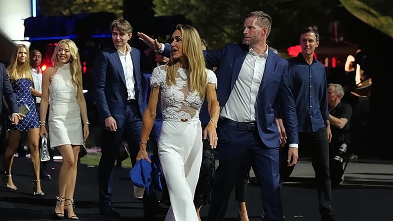 Eric Trump and his wife Lara, depart with Tiffany Trump, second from left, at the end of UFC event at the White House.