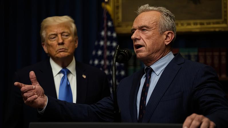 Robert F Kennedy Jr and Donald Trump at the White House in Washington DC on 22 September 2025.
