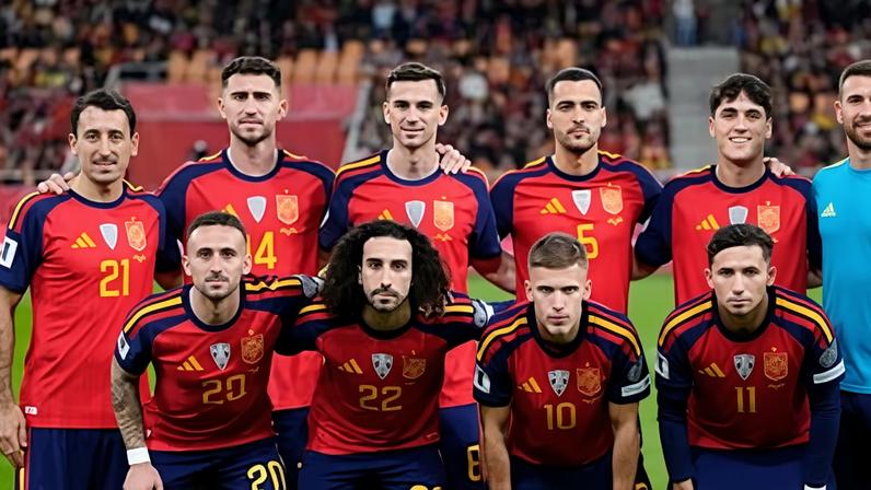 Spain line up (left to right) Mikel Oyarzabal, Aymeric Laporte, Fabián Ruiz, Mikel Merino, Pau Cubarsí, Unai Simón, Aleix García, Marc Cucurella, Dani Olmo, Yeremy Pino, Marcos Llorente before the World Cup 2026 qualifier with Turkey at Estadio de La Cartuja