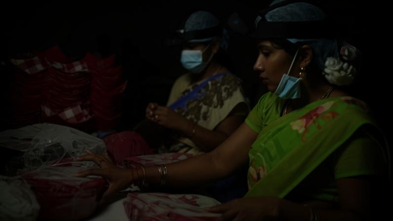 Workers wear cameras that record their movements and interactions at a factory in Karur district, Tamil Nadu.