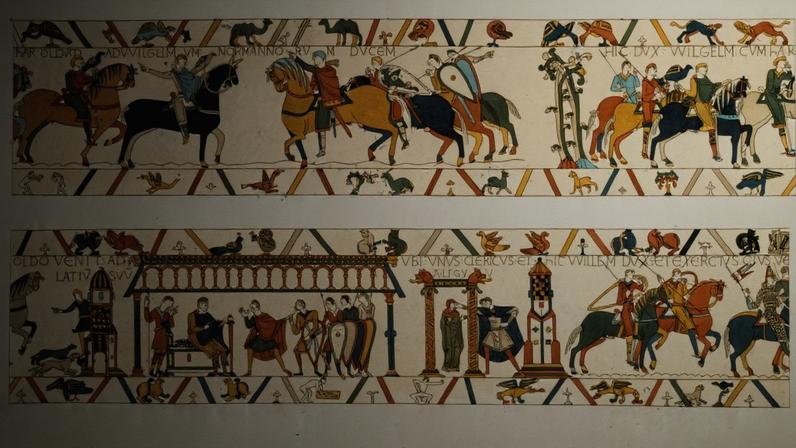 In a scene from the Bayeux Tapestry, William the Conqueror (c.1027 - 1087) rescues the future King Harold II (c.1022 - 1066) from captivity in France and betrothes his daughter Aelfgifu to him, 1064. The tapestry is housed in the town of Bayeux in Normandy. (Photo by Hulton Archive/Getty Images)