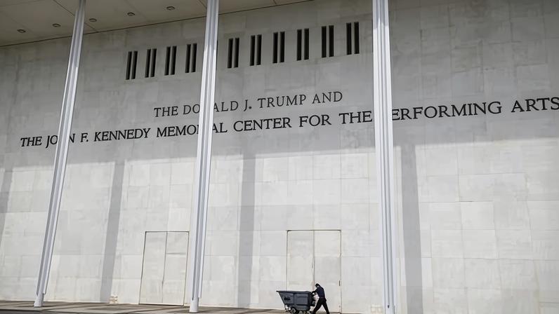 A man wheels a garbage bin outside the Kennedy Center on 6 June 2026 in Washington DC.