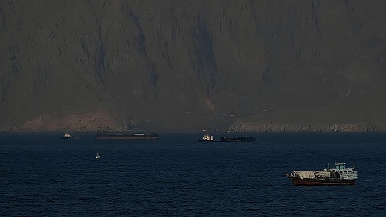 Ships and tankers remain stranded in the Strait of Hormuz off the coast of Musandam, Oman