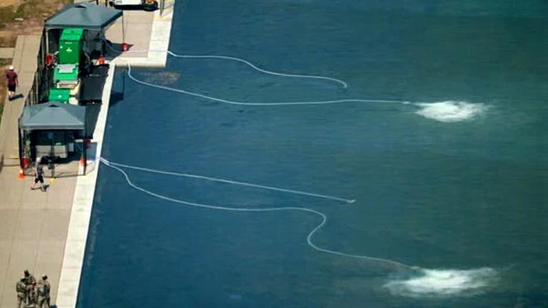 Machinery is deployed along the Lincoln Memorial reflecting pool to counter an algae bloom on 22 June 2026 in Washington DC.