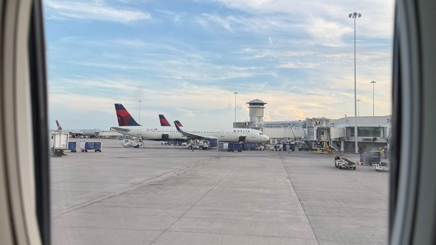 Delta Air Lines aircraft sit at gates at Hartsfield-Jackson Atlanta International Airport. The airline is headquartered in Atlanta and ATL is its biggest hub.