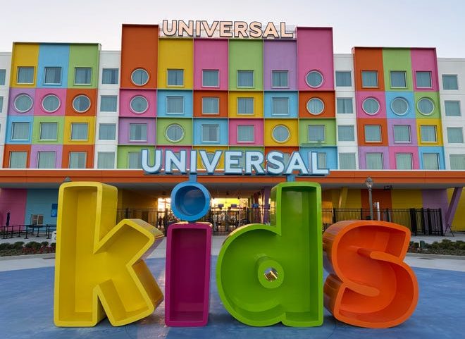 Universal Kids Resort's hotel sits at the front of the park. Guests walk under it to get to the park itself.