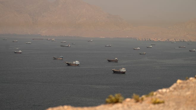 Vessels at the Strait of Hormuz, as seen from Musandam, Oman, June 18, 2026.