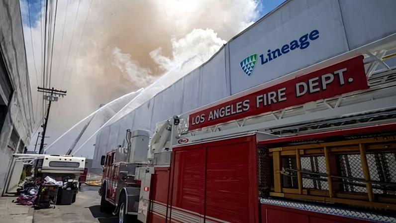 Fire crews work a warehouse fire in the Boyle Heights section of Los Angeles on Saturday.