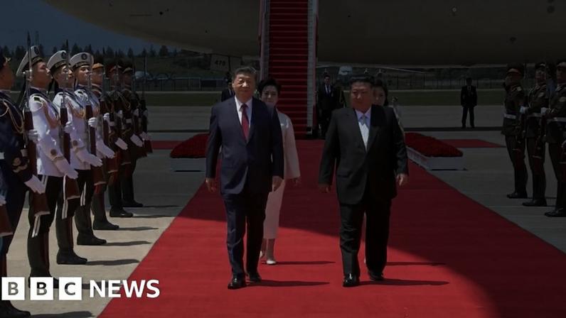 Xi Jinping and Kim Jong Un