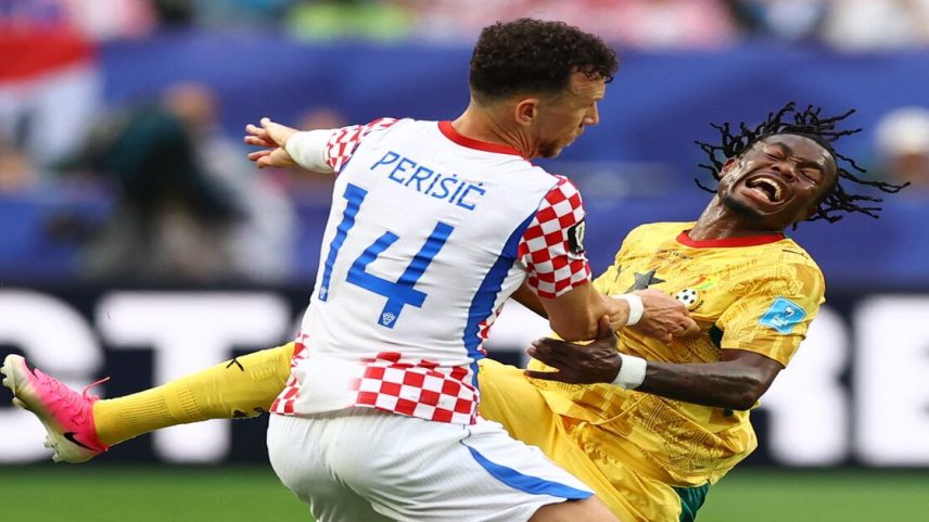 Soccer Football - FIFA World Cup 2026 - Group L - Croatia v Ghana - Philadelphia Stadium, Philadelphia, Pennsylvania, U.S. - June 27, 2026 Croatia's Ivan Perisic fouls Ghana's Abdul Fatawu leading to a yellow card REUTERS/Peter Cziborra
