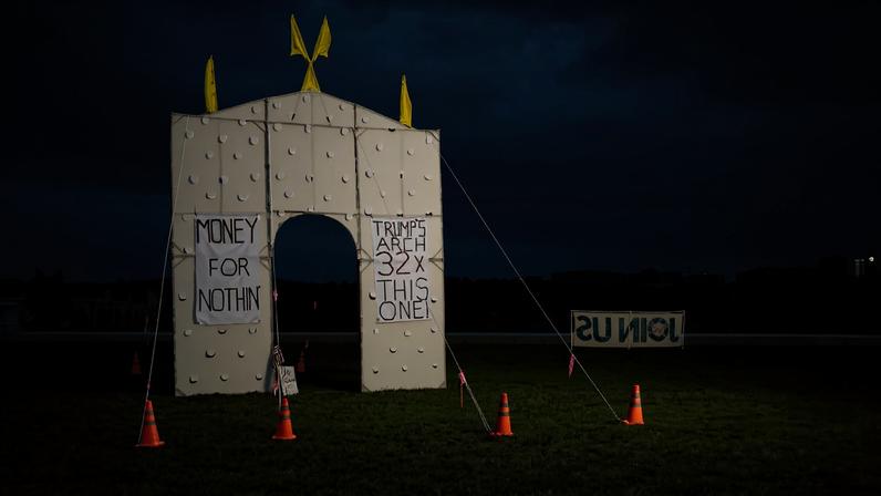 Demonstrators gather near Arlington Memorial Bridge to protest U.S. President Donald Trump's proposed 250-foot “Triumphal Arch” on May 26, 2026, in Washington, DC. Organizers from Third Act DMV say the planned structure is disrespectful to the solemn character of Arlington National Cemetery.