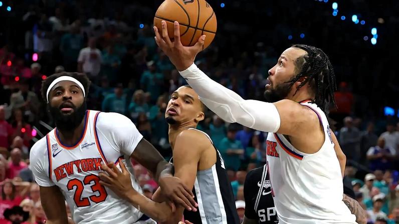 Jalen Brunson scoops in a fourth-quarter layup to rally the Knicks past the Spurs in Game 1 of the NBA Finals. “I thought, ‘He’s not coming back,’" Walt Frazier said of Brunson, who left with an injury in the first quarter. "And all of a sudden he got a second wind."
