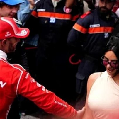 Kim Kardashian recebe beijo e chuva de champanhe de Lewis Hamilton na F1