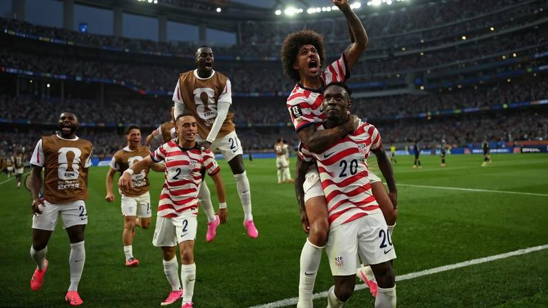 Folarin Balogun celebrates a goal vs. Paraguay at the World Cup