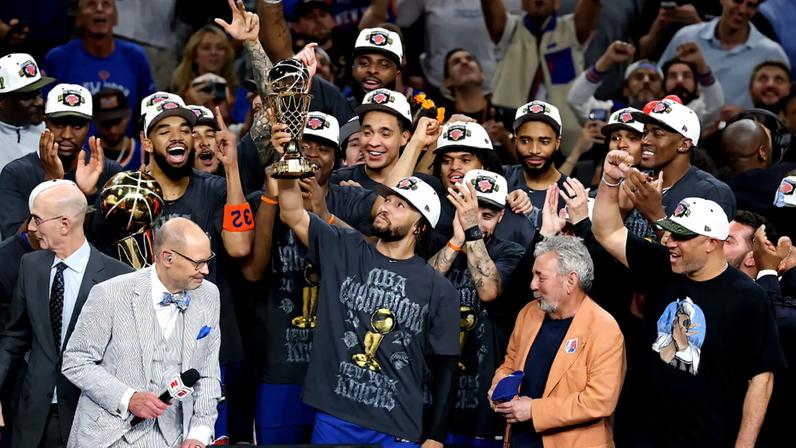 The Knicks celebrate winning the 2026 NBA title.