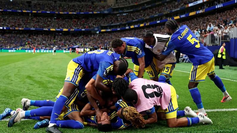 Curacao celebrate Livano Comenencia's goal against Germany - the country's first at a World Cup