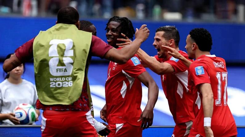Switzerland celebrates Johan Manzambi's goal vs. Bosnia and Herzegovina in a pivotal World Cup Group B result.