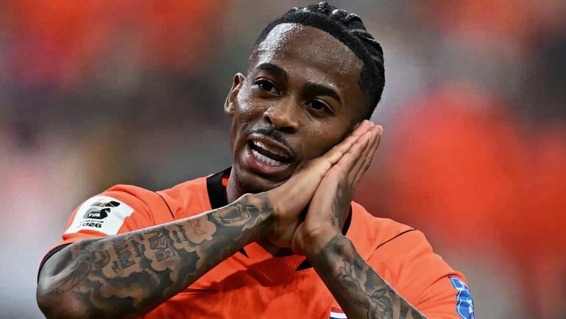 Crysencio Summerville celebrates Netherlands' fifth goal against Sweden