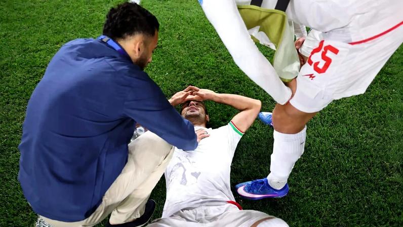 Shoja Khalilzadeh shows his upset after Iran's late winner is denied
