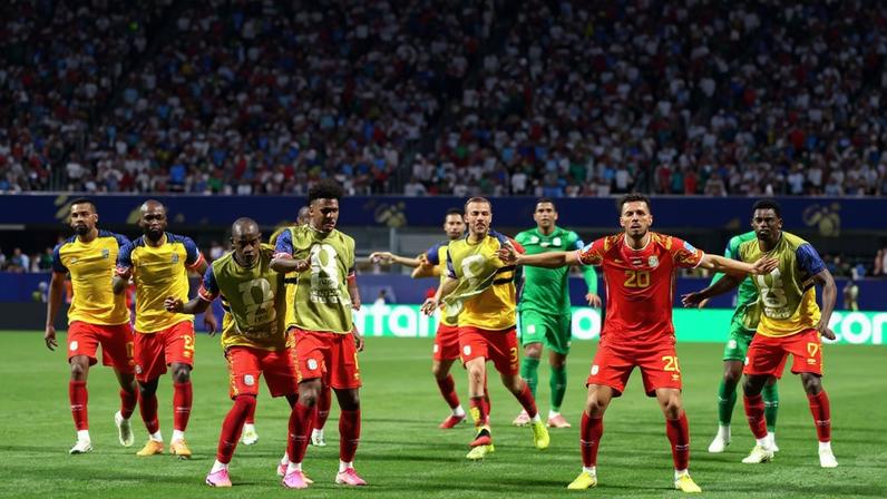 Yoane Wissa leads the celebrations after his second goal sealed a famous win