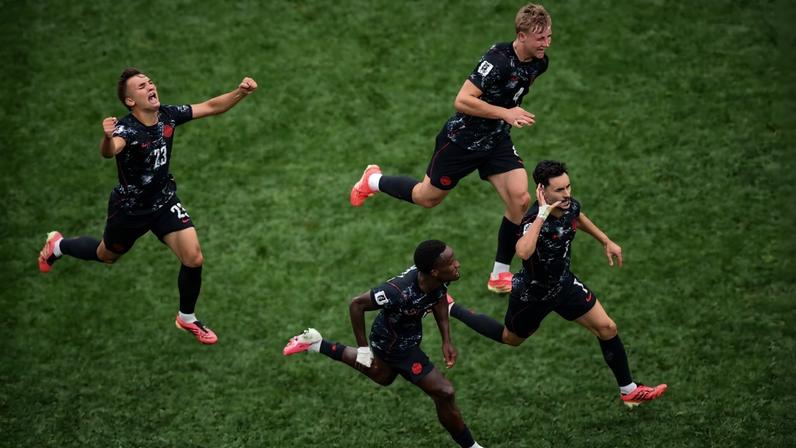 Stephen Eustaquio and his Canada team-mates celebrate scoring against South Africa