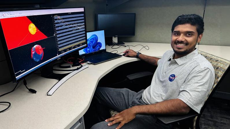 Rohit Goeptar, an electromagnetic/radio frequency analyst with NASA’s Launch Services Program at the agency’s Kennedy Space Center in Florida, reviews a radio frequency link budget analysis for NASA’s Nancy Grace Roman Space Telescope from his office. Goeptar is among the engineers and technicians sworn in as new NASA civil servants as part of NASA Administrator Jared Isaacman’s workforce directive to restore technical core competencies within the civil servants ranks.