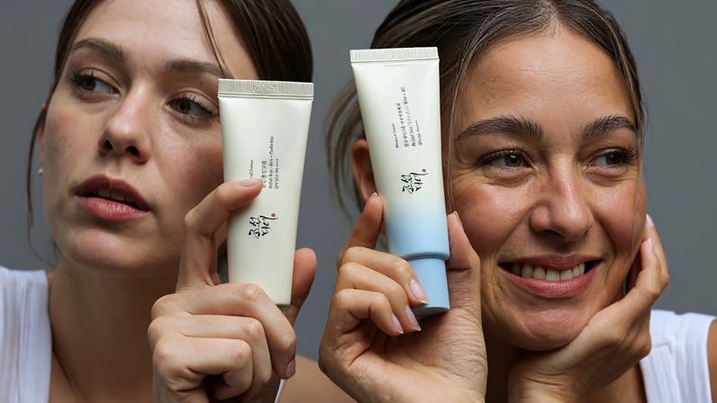 Models holding bottles of Beauty of Joseon sunscreens.