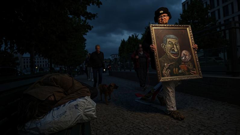 Russian artist and activist Semyon Skrepetsky walks through central Berlin during a Russia Day action on June 12, 2026.