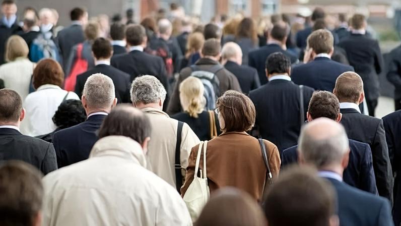 Overhead shot of people walking to work.