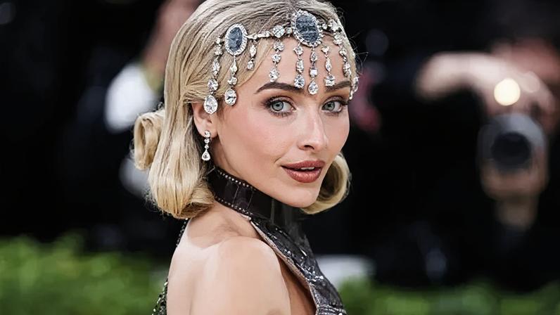 EPA/Shutterstock US musician and actress Sabrina Carpenter poses on the red carpet for the Met Gala in May 2026