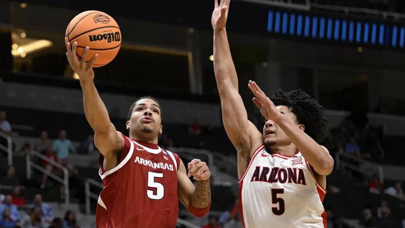 Darius Acuff Jr., left, and Brayden Burries are among a big group of guards who will make NBA Draft picks Nos. 5-10 fascinating.