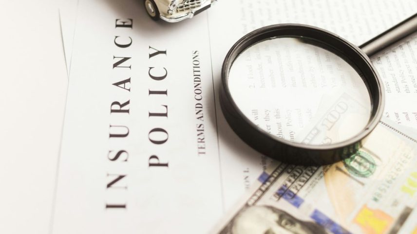 Magnifying glass on an insurance policy as Aviva has uncovered a record £230 million in insurance fraud claims and is using AI tools to counter the growing problem.