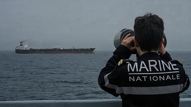French Navy personnel observe a tanker said to be part of Russia's so-called shadow fleet