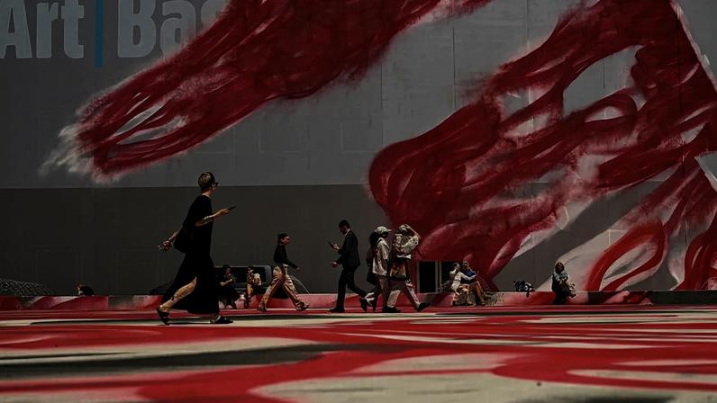 Visitors walk past Katharina Grosse's "CHOIR", 2025, at Art Basel last year.