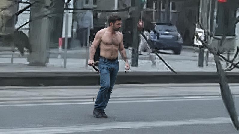 Video footage showed a bare-chested man carrying a weapon on Leith Walk
