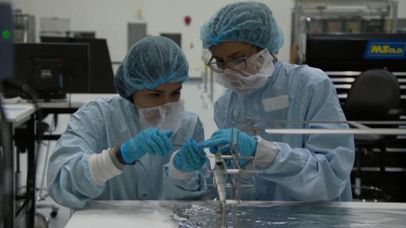 Space Technology Mission Directorate, Two mechanical engineers working on the calibration gas system