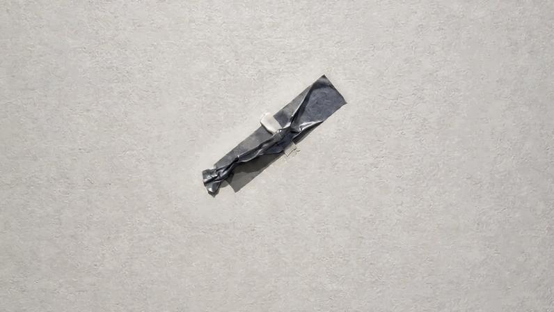 The duct-tape left on the wall after Maurizio Cattelan's "Comedian" was stolen.