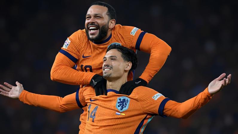 FILE PHOTO: Soccer Football - Nations League - Quarter Final - First Leg - Netherlands v Spain - Feyenoord Stadium, Rotterdam, Netherlands - March 20, 2025 Netherlands' Tijjani Reijnders celebrates scoring their second goal with Memphis Depay REUTERS/Fabian Bimmer/File Photo