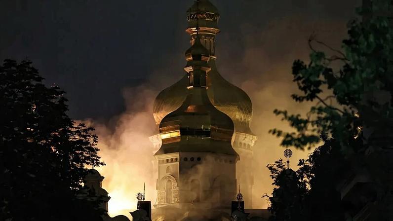 KYIV, UKRAINE - JUNE 15: Smoke rises from a fire on the roof of the Dormition Cathedral of the Kyiv Pechersk Lavra (UNESCO World Heritage Site) hit by a Russian drone strike on June 15, 2026 in Kyiv, Ukraine. Russia’s massive missile and drone attacks on Kyiv on the night of June 15 hit residential buildings, the Kyiv-Pechersk Lavra (UNESCO World Heritage Site), the Mystetskyi Arsenal National Art and Culture Museum Complex, the Dovzhenko Film Studios. The attack resulted in civilian casualties. (Photo by Yan Dobronosov/Global Images Ukraine via Getty Images)