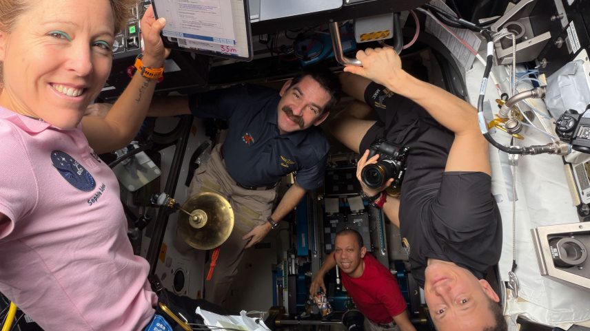 Expedition 74 crew members (from left) Sophie Adenot of ESA (European Space Agency), NASA astronauts Jack Hathaway and Chris Williams, and Roscosmos cosmonaut Sergey Kud‑Sverchkov pose for a portrait together inside the International Space Station’s cupola and Tranquility module.