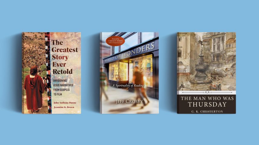 Three books on a blue background.