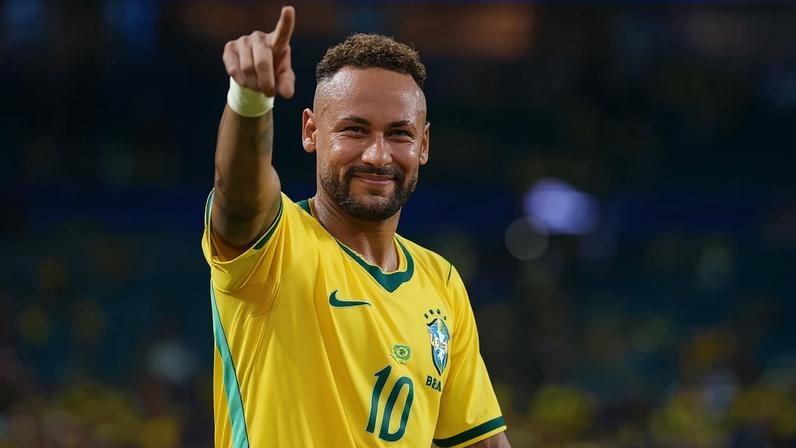 Neymar Jr. com a camisa da Seleção apontando para a câmera em jogo do Brasil - Metrópoles