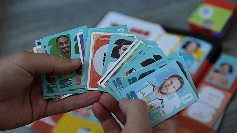 Alamy A collection of World Cup 2026 stickers fanned in someone's hands (Credit: Alamy)