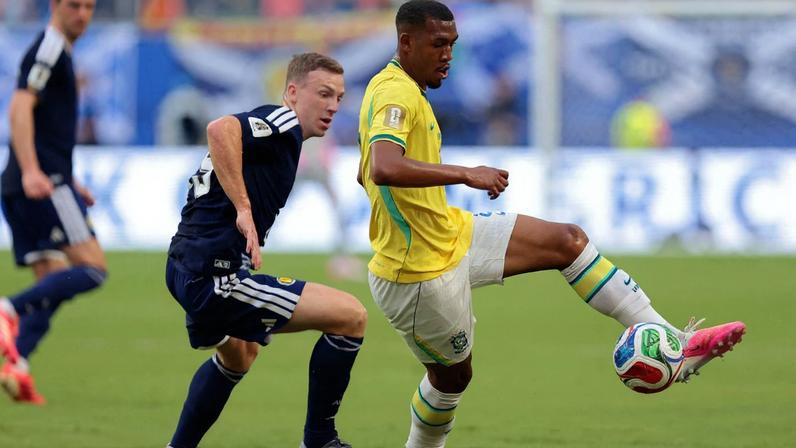 Brazil's Rayan in action with Scotland's Lewis Ferguson IMAGN IMAGES via Reuters/Sam Navarro
