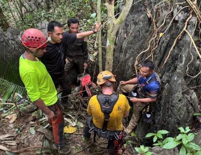 Laos: equipes abrem novas entradas de caverna para localizar desaparecidos
