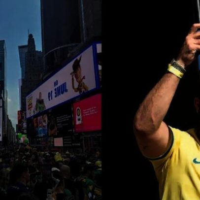 Brasileiros fecham Times Square com bandeiraço antes da estreia da seleção